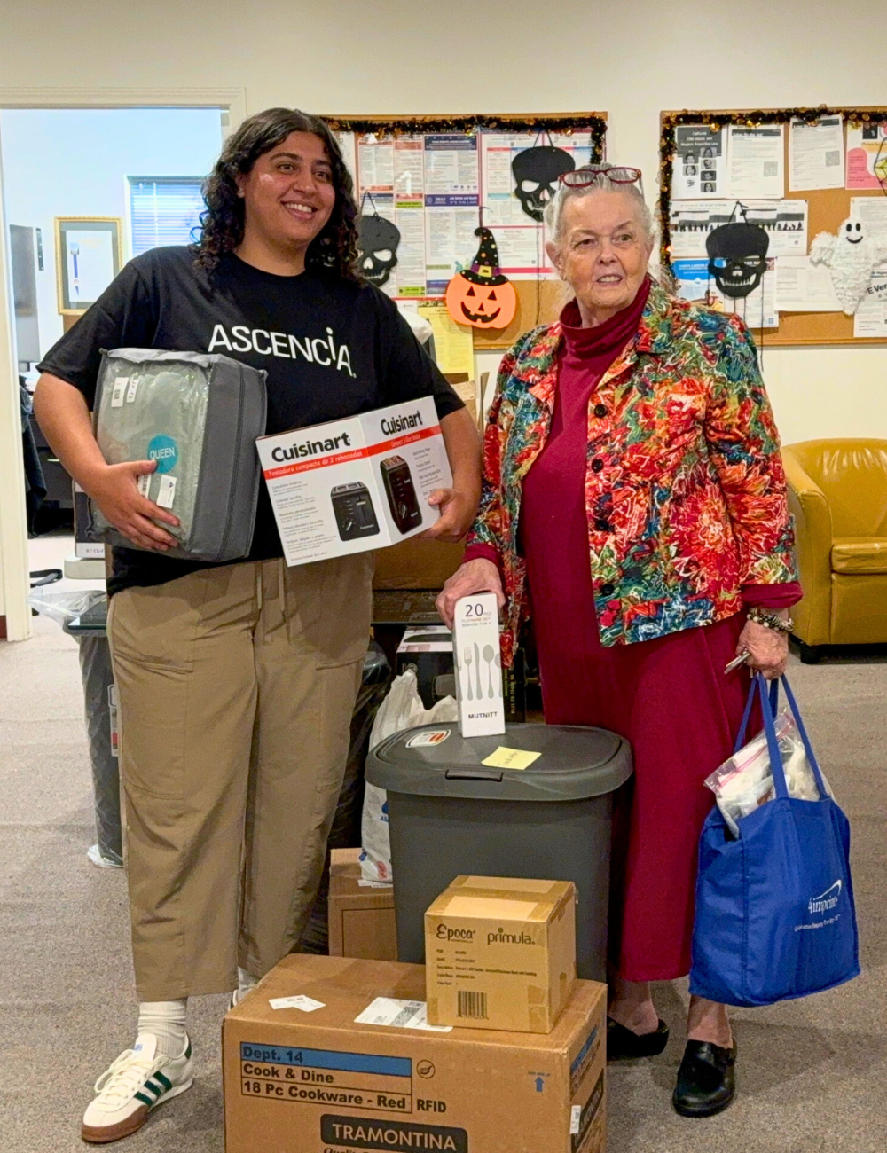 Client Judith and Case Manager Zana with Move-in Donations.